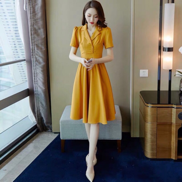 Đầm sm vàng nghệ nút bọc