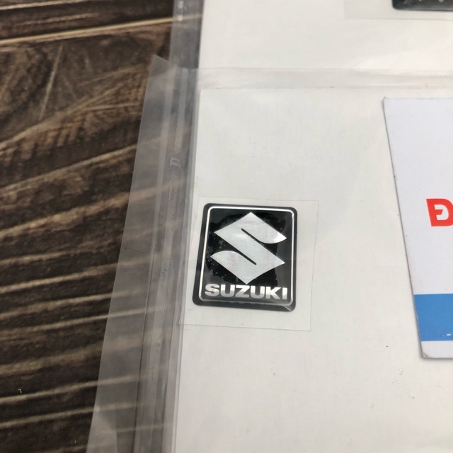 Tem logo suzuki nắp bình nước satria fi raider fi