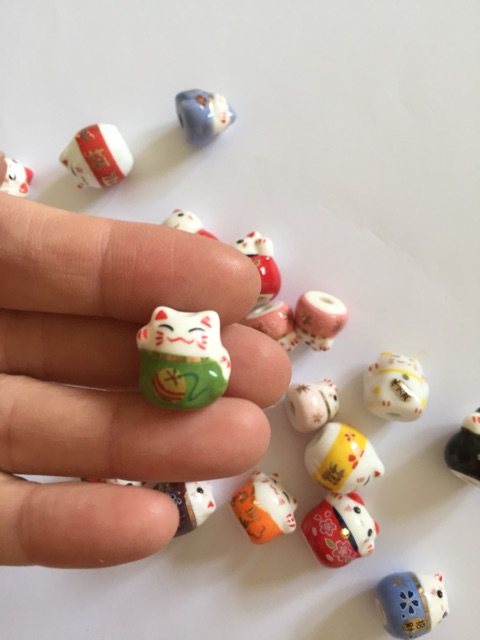 Mèo gốm thần tài đủ màu