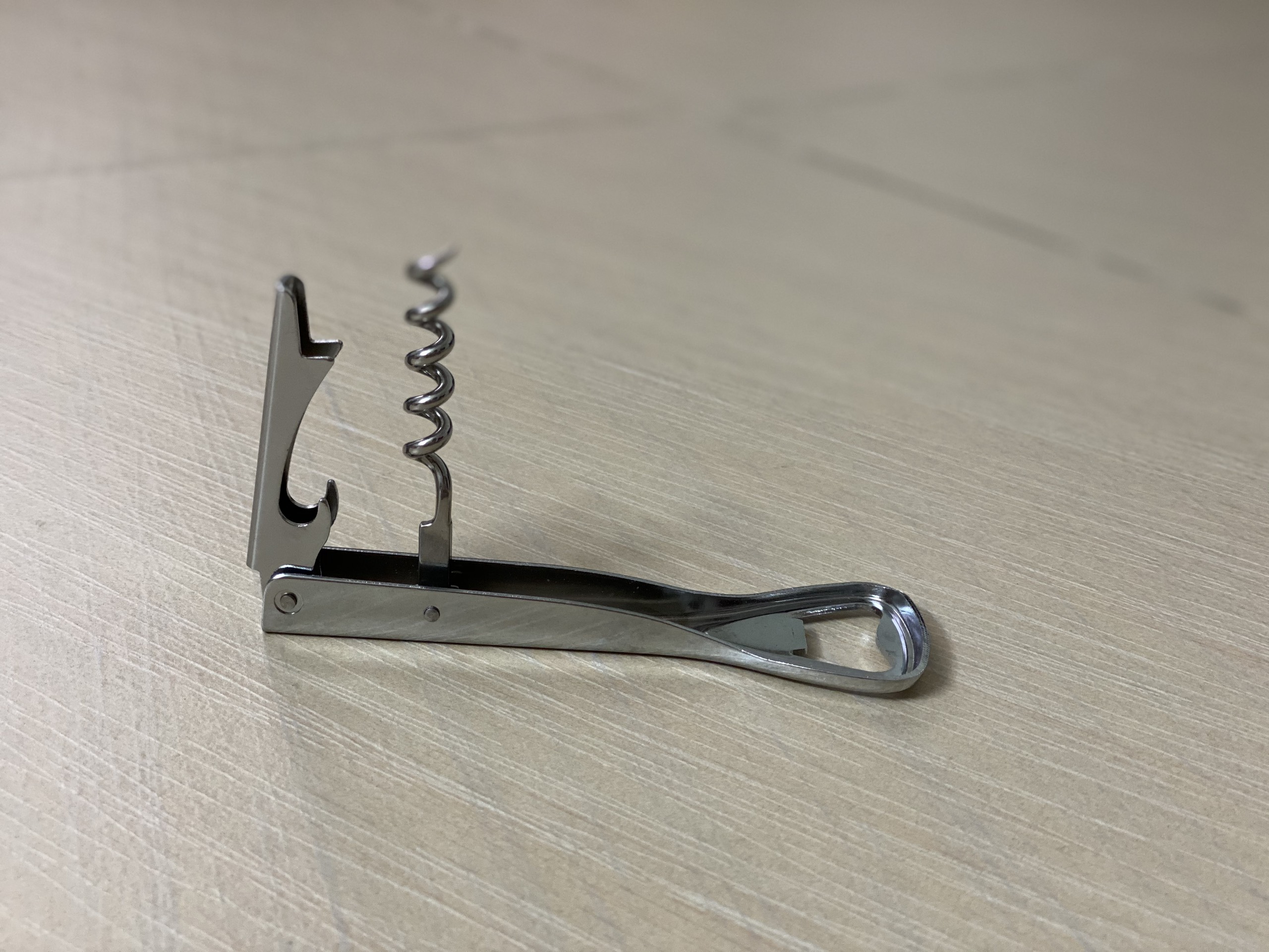 Bottle cap opener opening tool