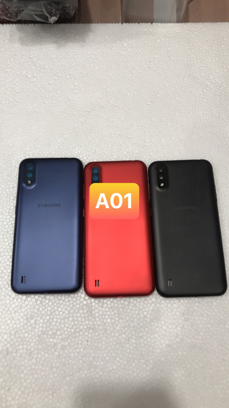 bộ vỏ a01 -samsung ( gồm sườn.lưng phím, kính cam)