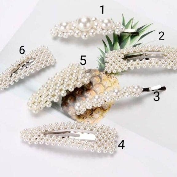 kẹp tóc đính ngọc trai kute