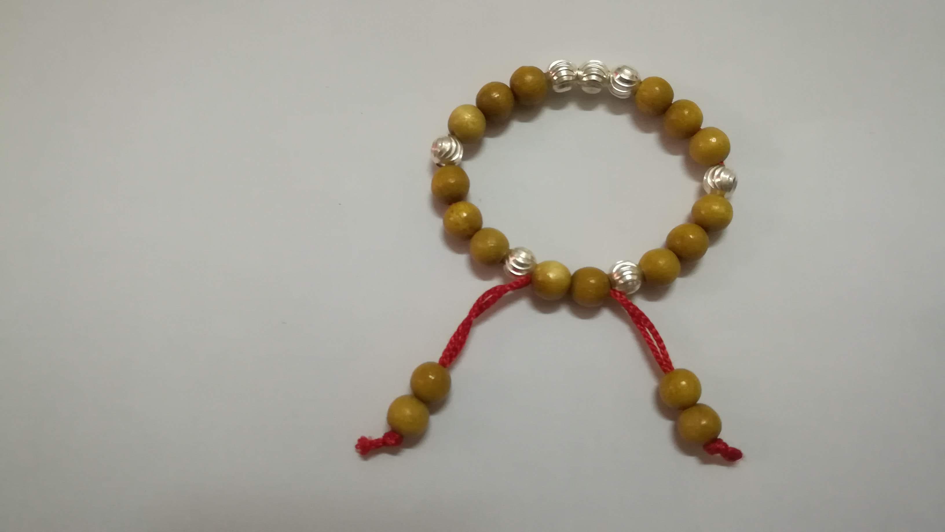 Vòng dâu tằm 7 bi bạc vía bé trai