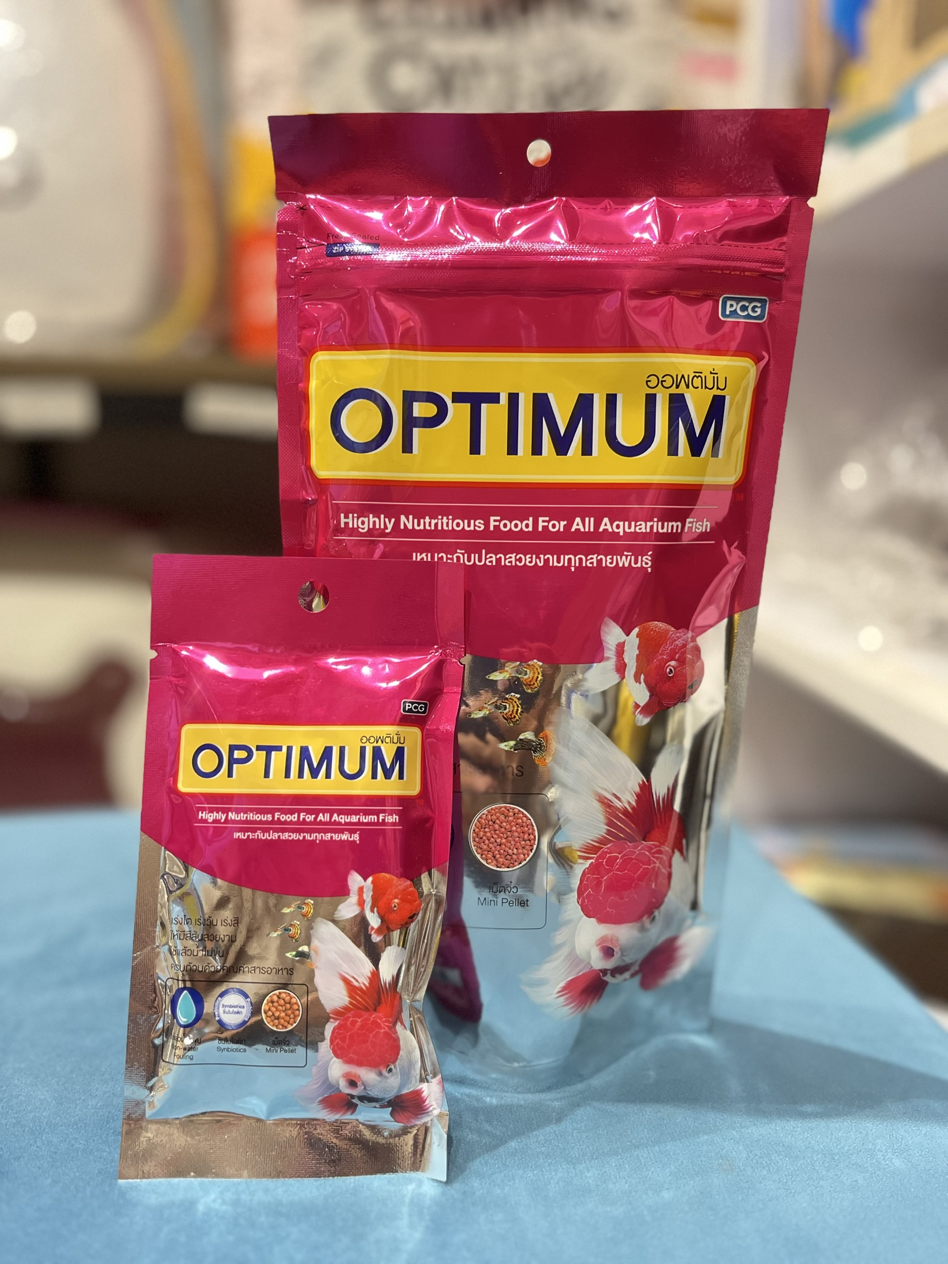 Thức ăn cho cá cảnh- OPTIMUM (Made inThailand) - (gói 20g-100g-200g)-cho cá vàng,cá cảnh, cá kiếm, ông tiên, Betta