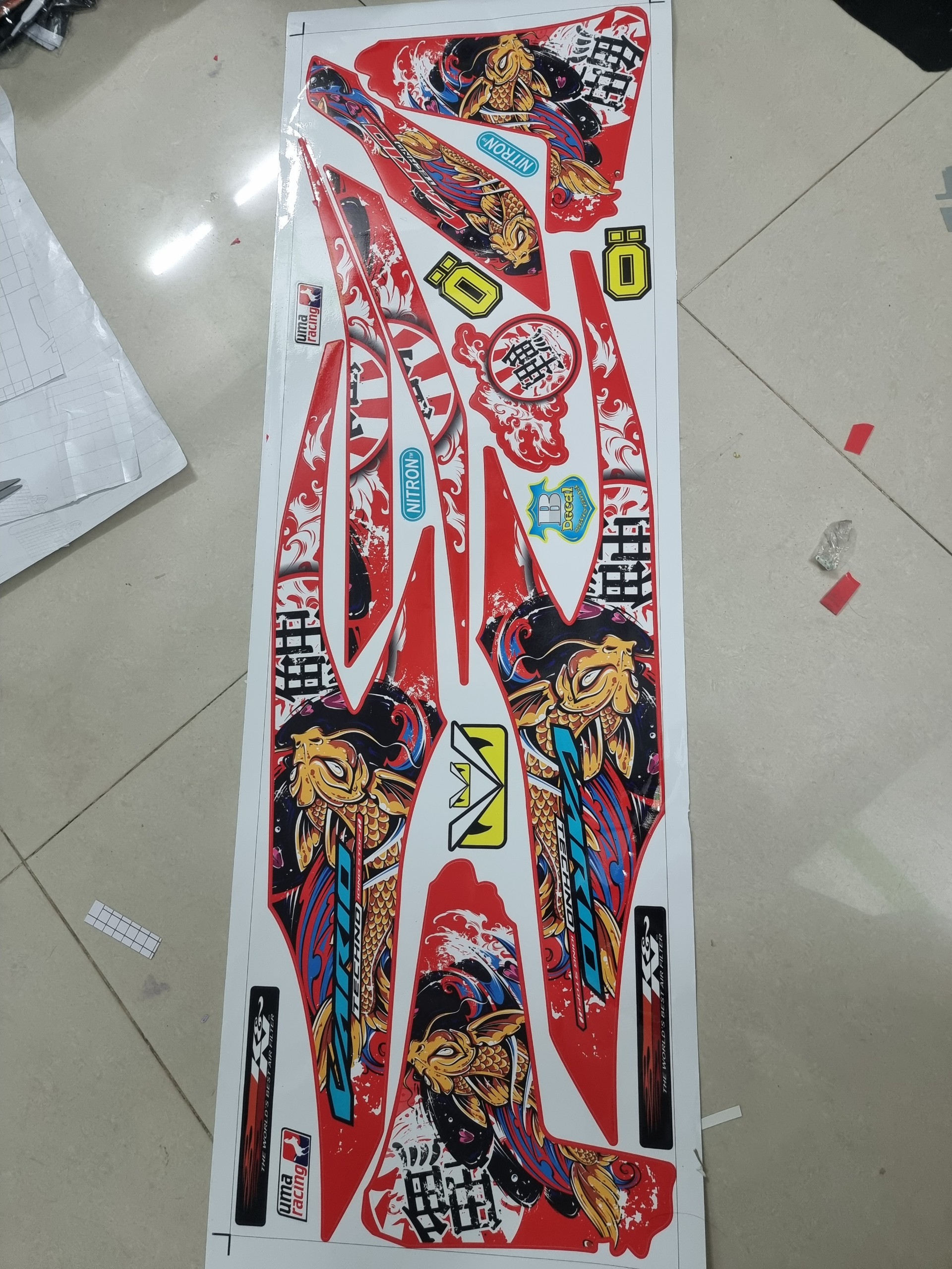Tem xe vario cá chép dán xe đỏ