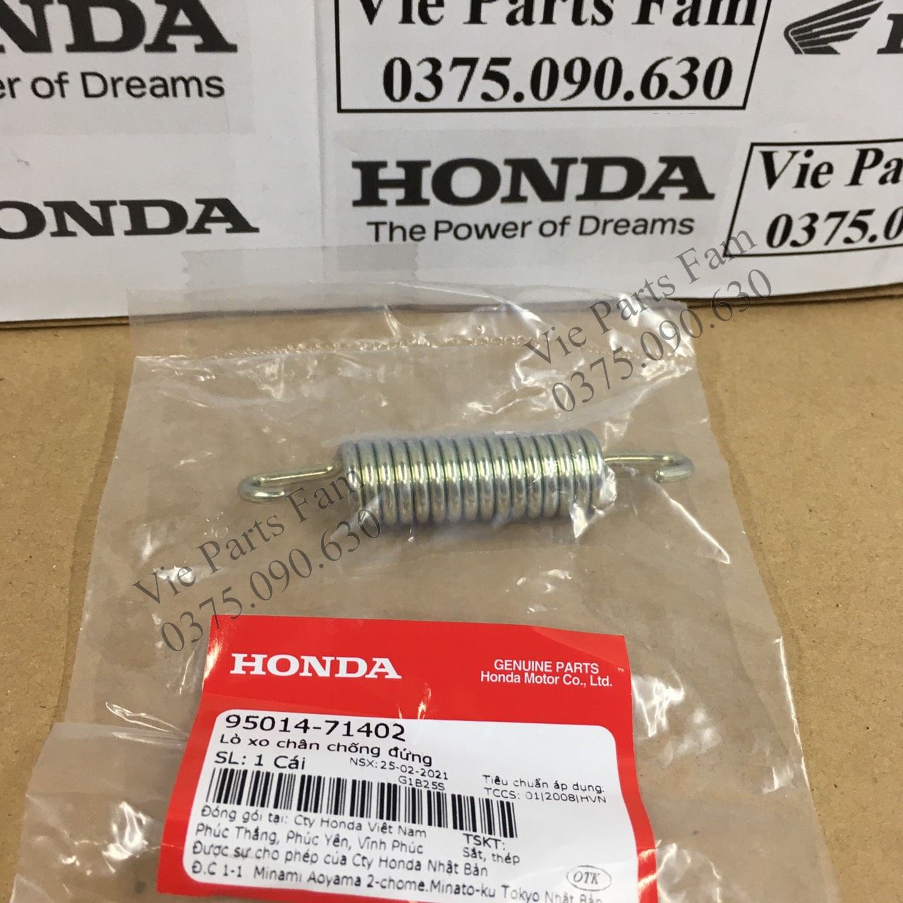 Lò xo chân chống Honda