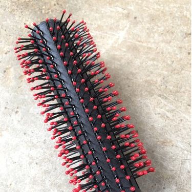 Lược tròn tạo phồng cho tóc uốn xoăn
