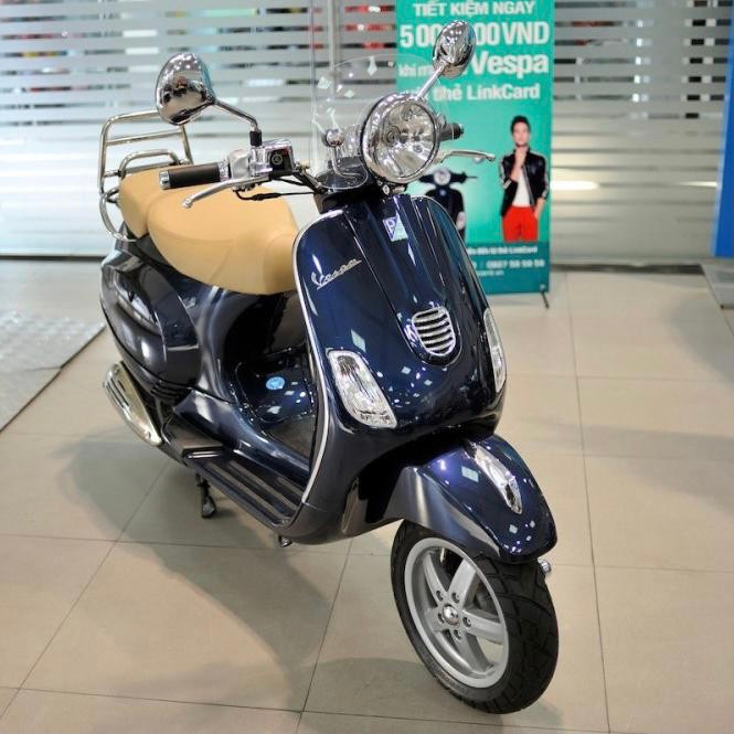 Gáo đèn pha Vespa LXV ( chính hãng )