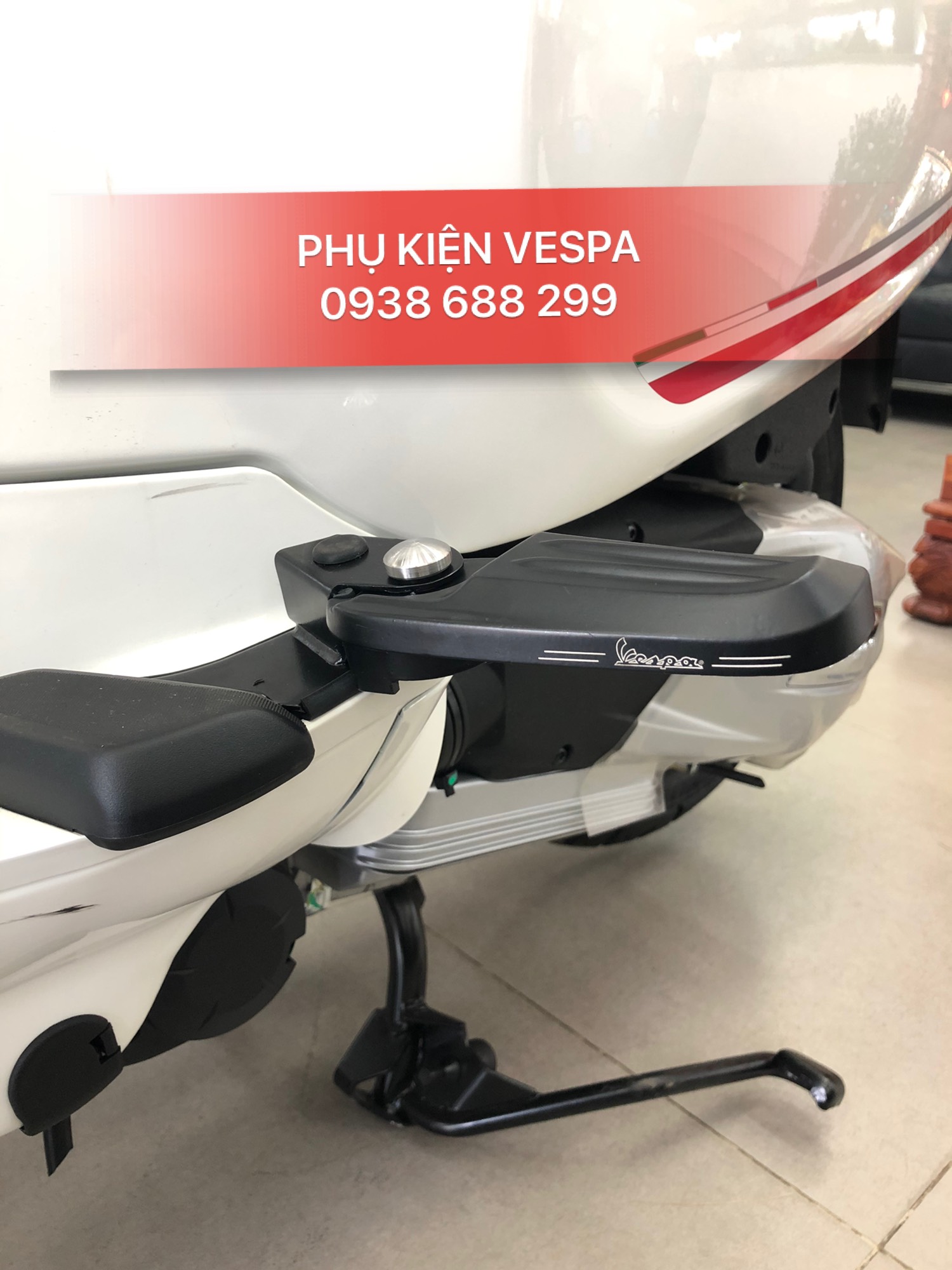 [HCM]gác chân vespa có nút bấm