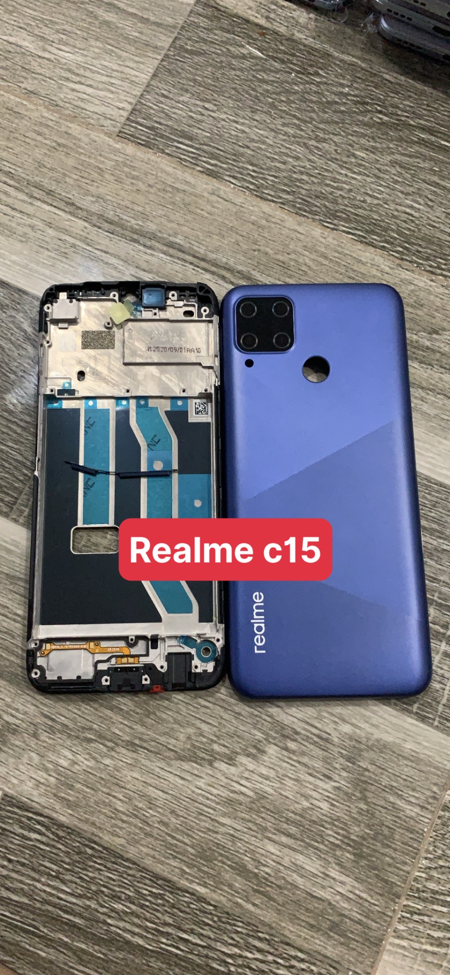 bộ vỏ realme C15 ( gồn, sườn, lưng,nút bấn,kính cam )zin