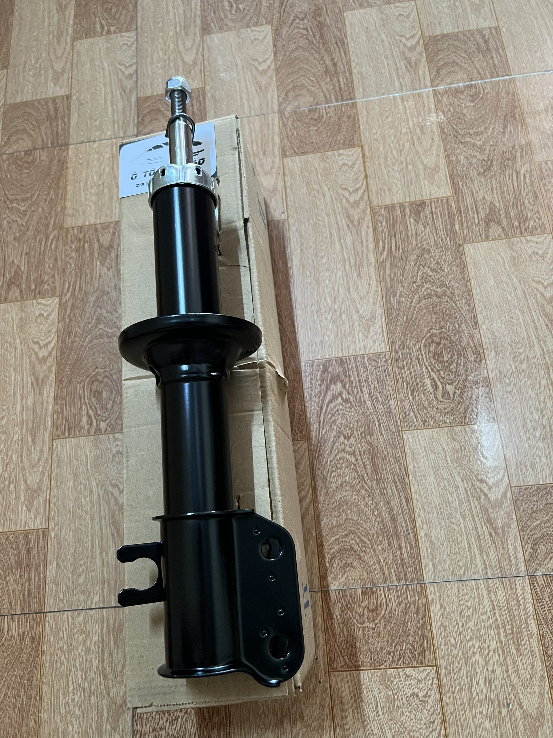 giảm xóc trước matiz đời 99 - 2007 , cherry qq , oem
