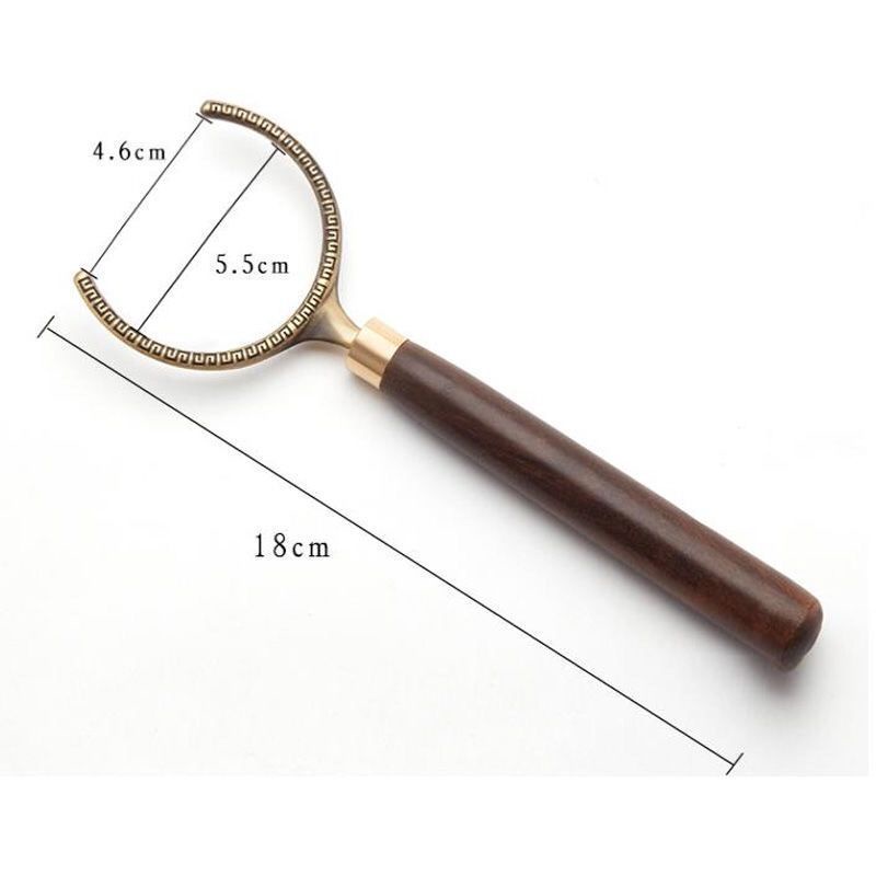 Dụng cụ đưa chén trà - đồng cán gỗ mun