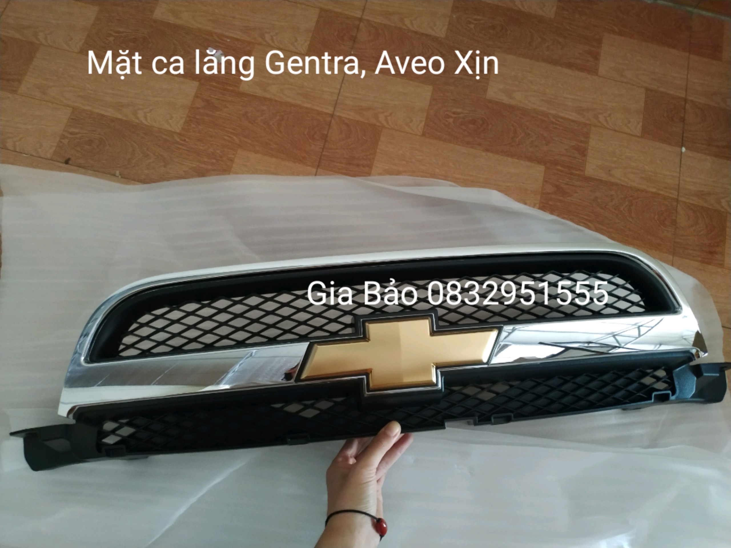 Mặt ga lăng Aveo , Gentra , xịn, dấu cộng