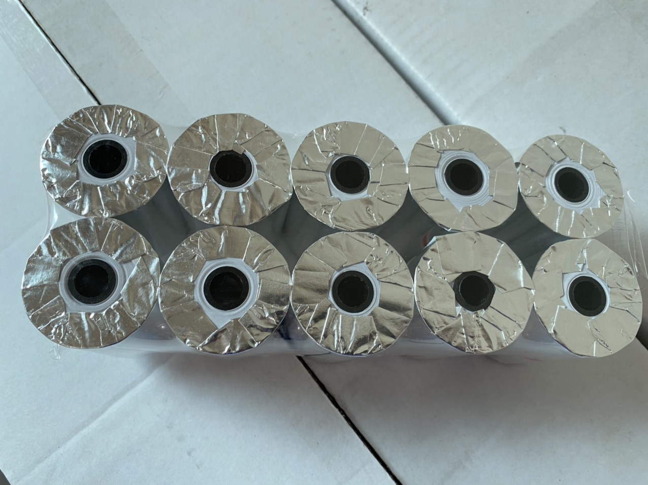 Combo 50 cuộn giấy in nhiệt k57 phi 45