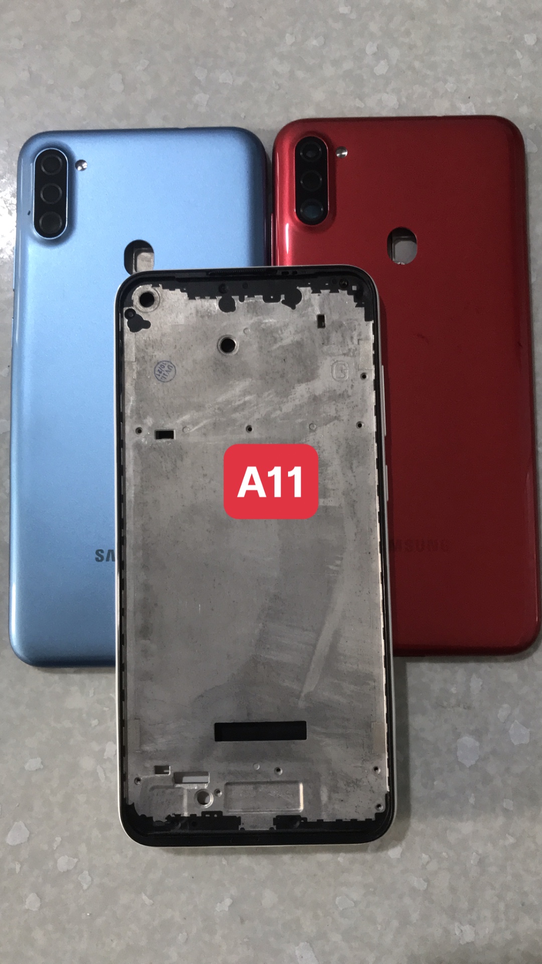 Bộ vỏ sườn Samsung A11 new (bộ gồm lưng,khung xương ,nút bấm,kính camera )