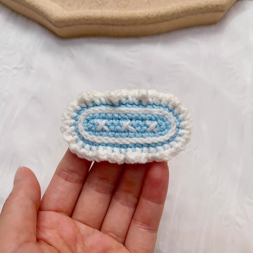 Kẹp tóc viền bằng len handmade