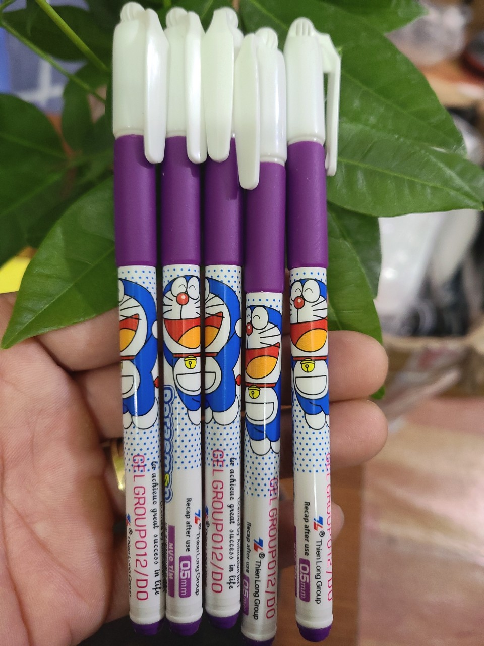 05 Cây Bút gel Doremon mực tím ( Ngòi 0,5mm )