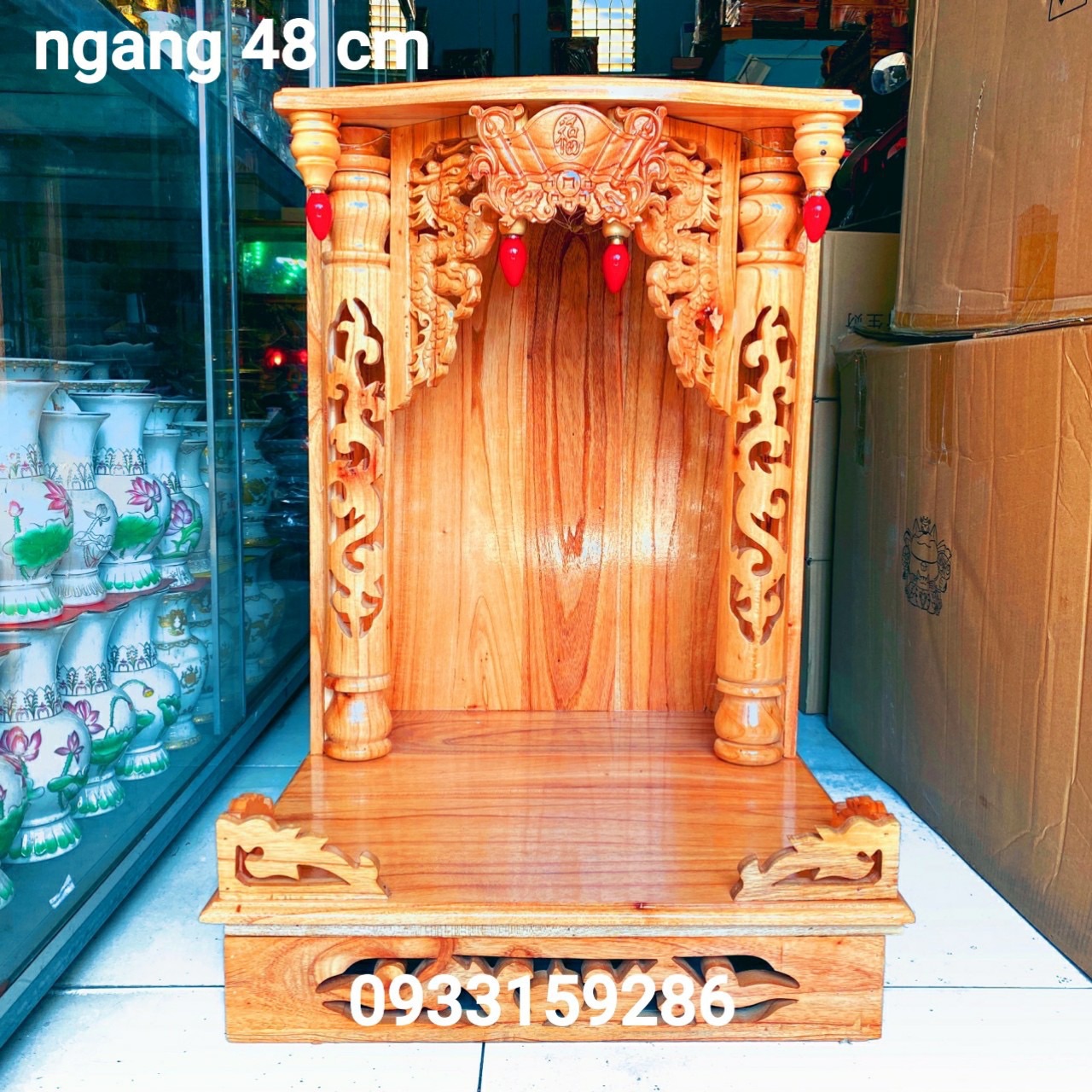 Bàn thờ thần tài ông địa gỗ xoan ngang 48 cm lọng hộp