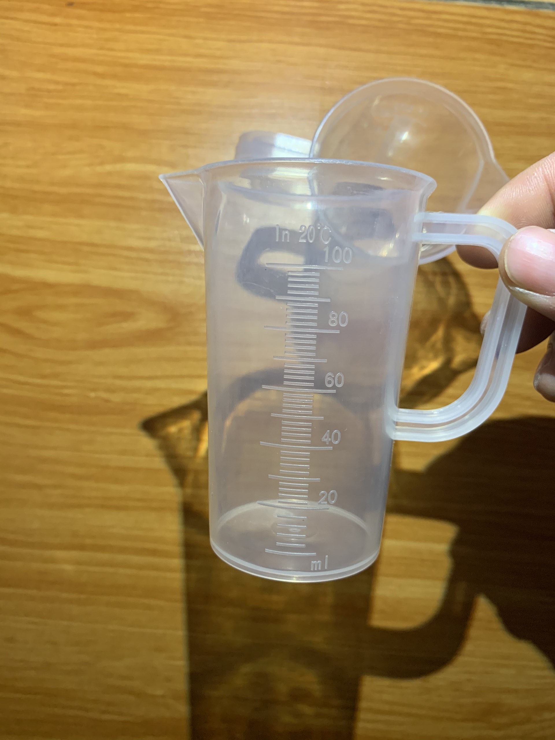 Cốc đong nhựa có quai 100ml