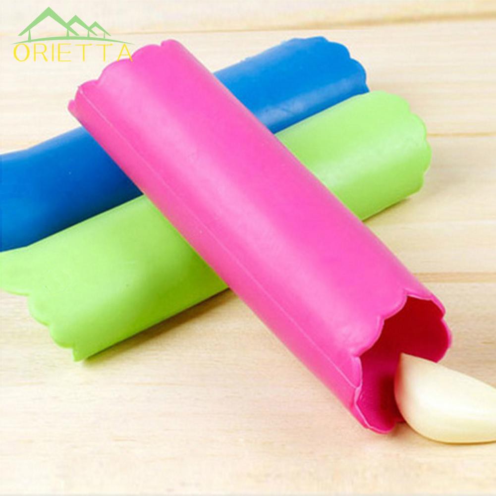 Dụng cụ bóc vỏ tỏi silicon không hôi tay