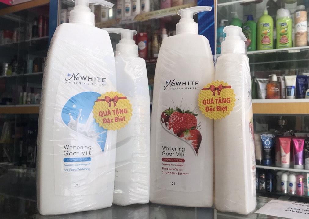 Sữa tắm trắng da NuWhite tinh chất 1.2 lít ( cty hết hàng tặng )
