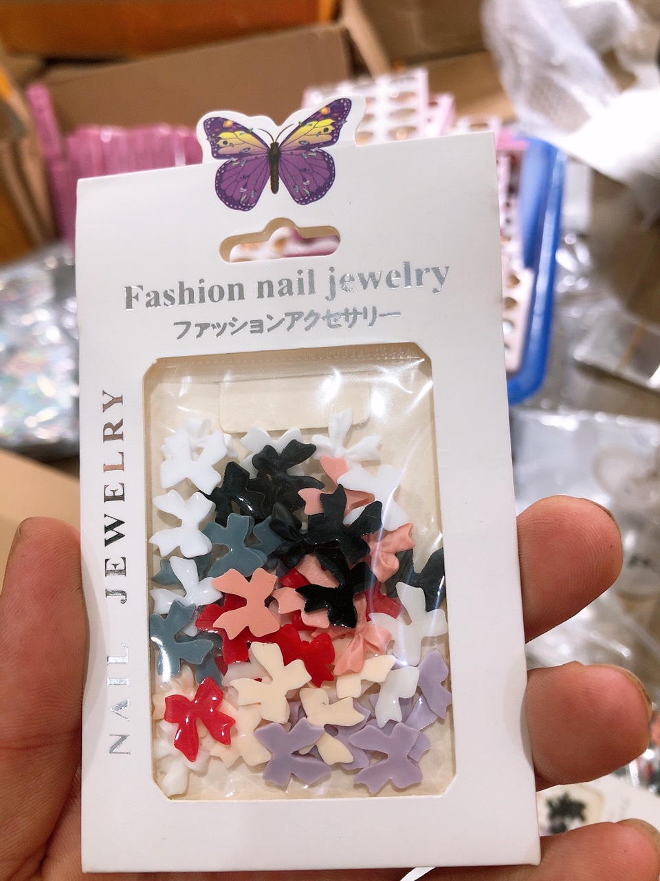Nơ mix màu trang trí móng gói 50c