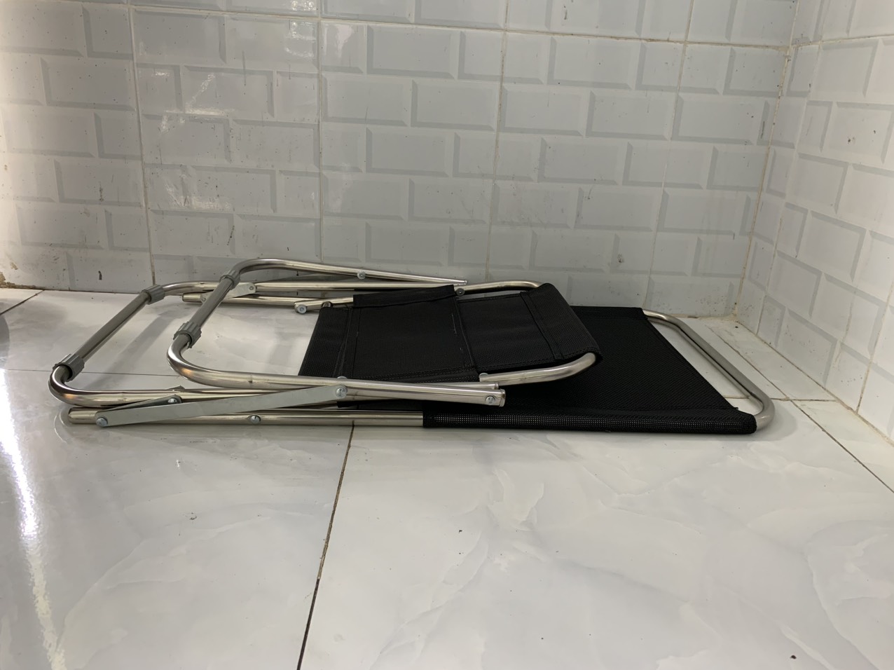 Ghế xếp inox lưới đen DP09