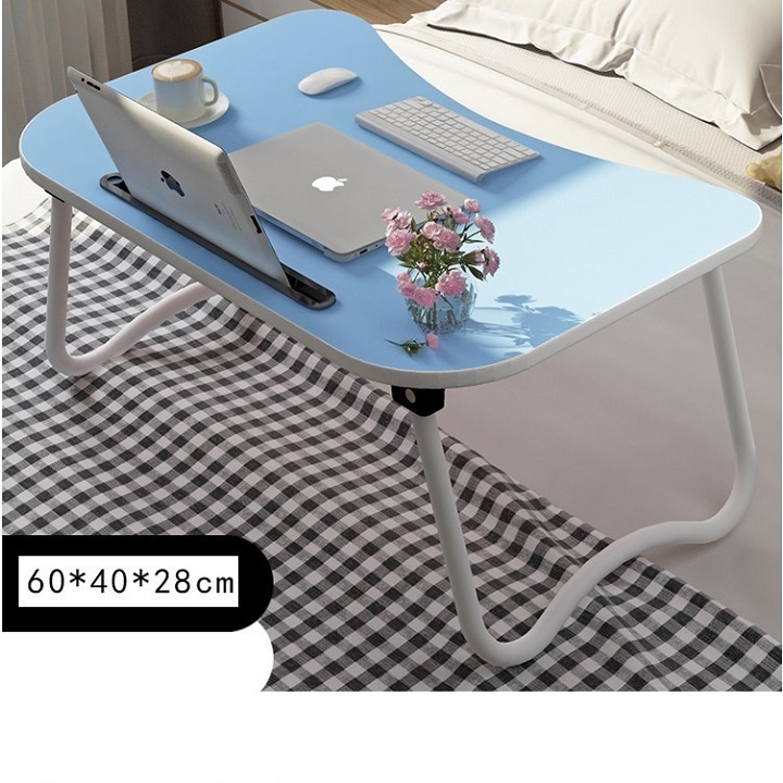 Folding study table compact has slot for iPad