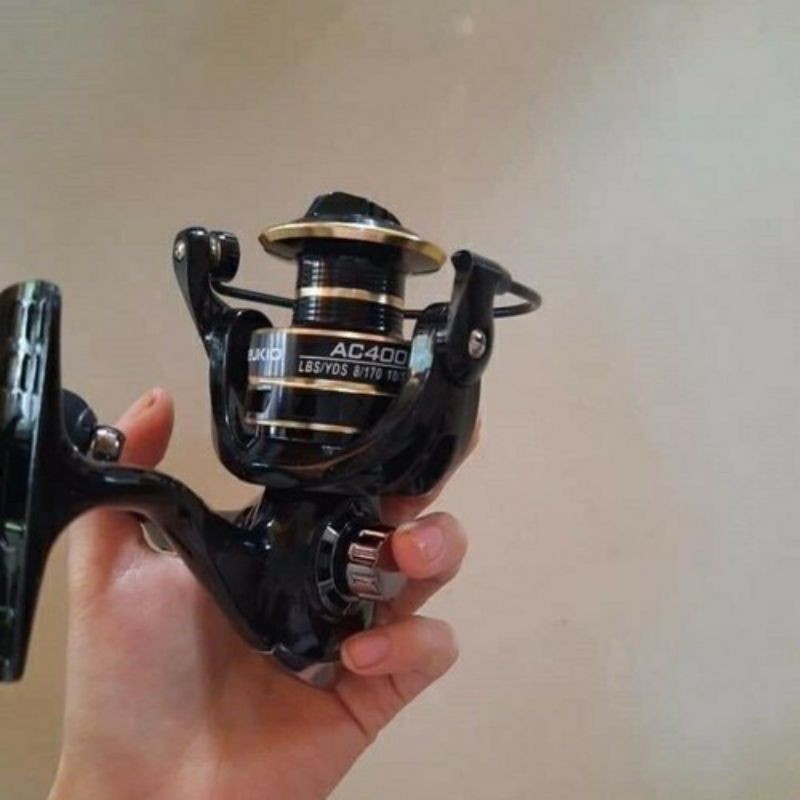 combo cần đặc 2 khúc + máy câu Deukio AC  (cam kết bán hàng chất lượng có bảo hành)
