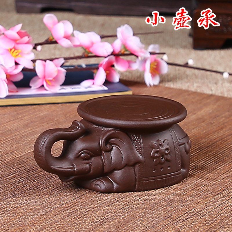 Đôn gốm cõng ấm trà tử sa