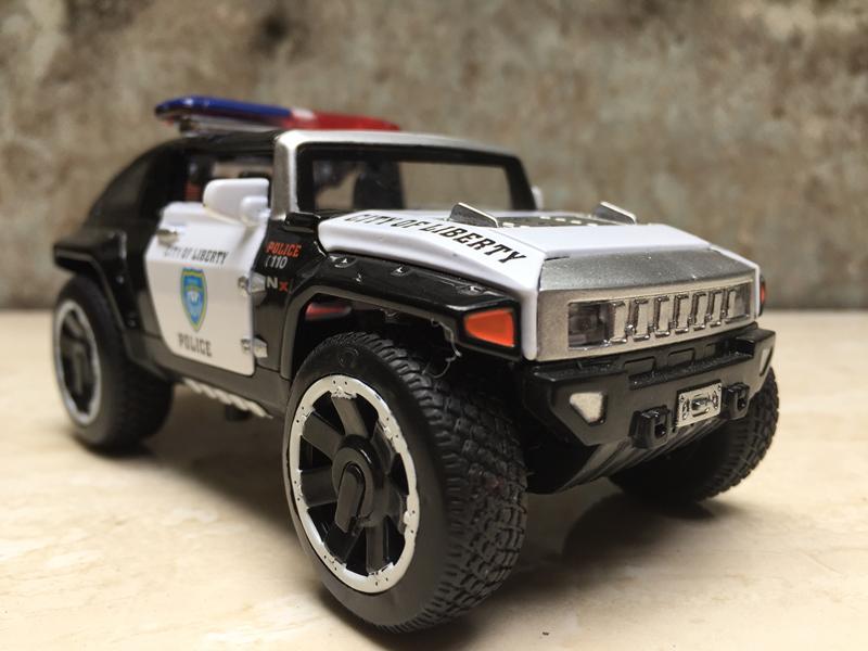 [HCM]Mô hình xe Cảnh.sát Hummer HX 1:32