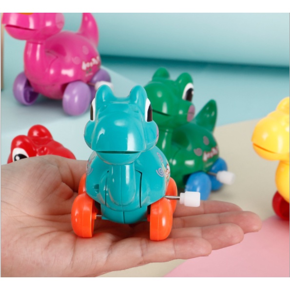 Đồ chơi con lên dây cót hình khủng long cho bé - xe chạy cót