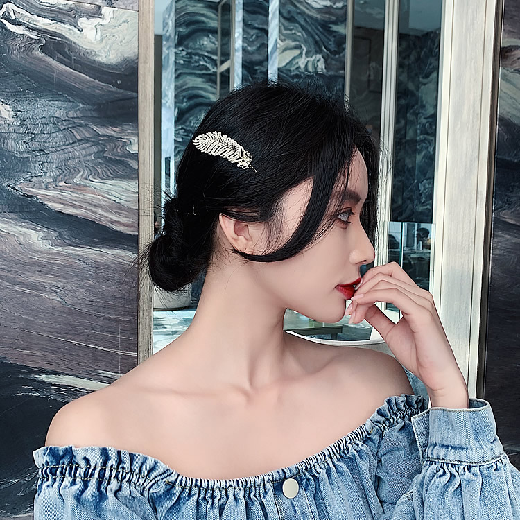 Kẹp tóc họa tiết lông vũ đính đá lấp lánh TOC09