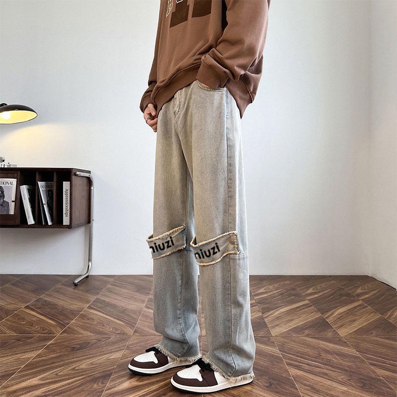 Quần jean nam họa tiết bấm đầu gốiquần jean nam nữ Miuzi DT168