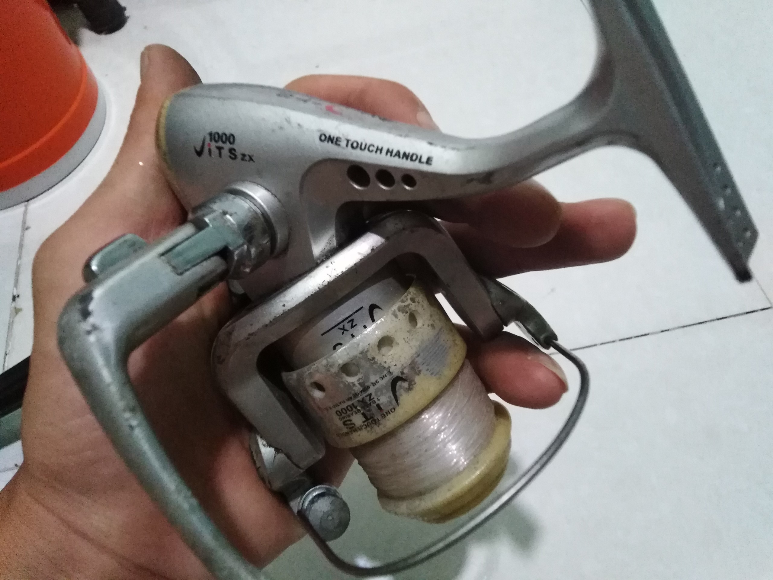 Máy câu bãi nhật one touch handle 1000