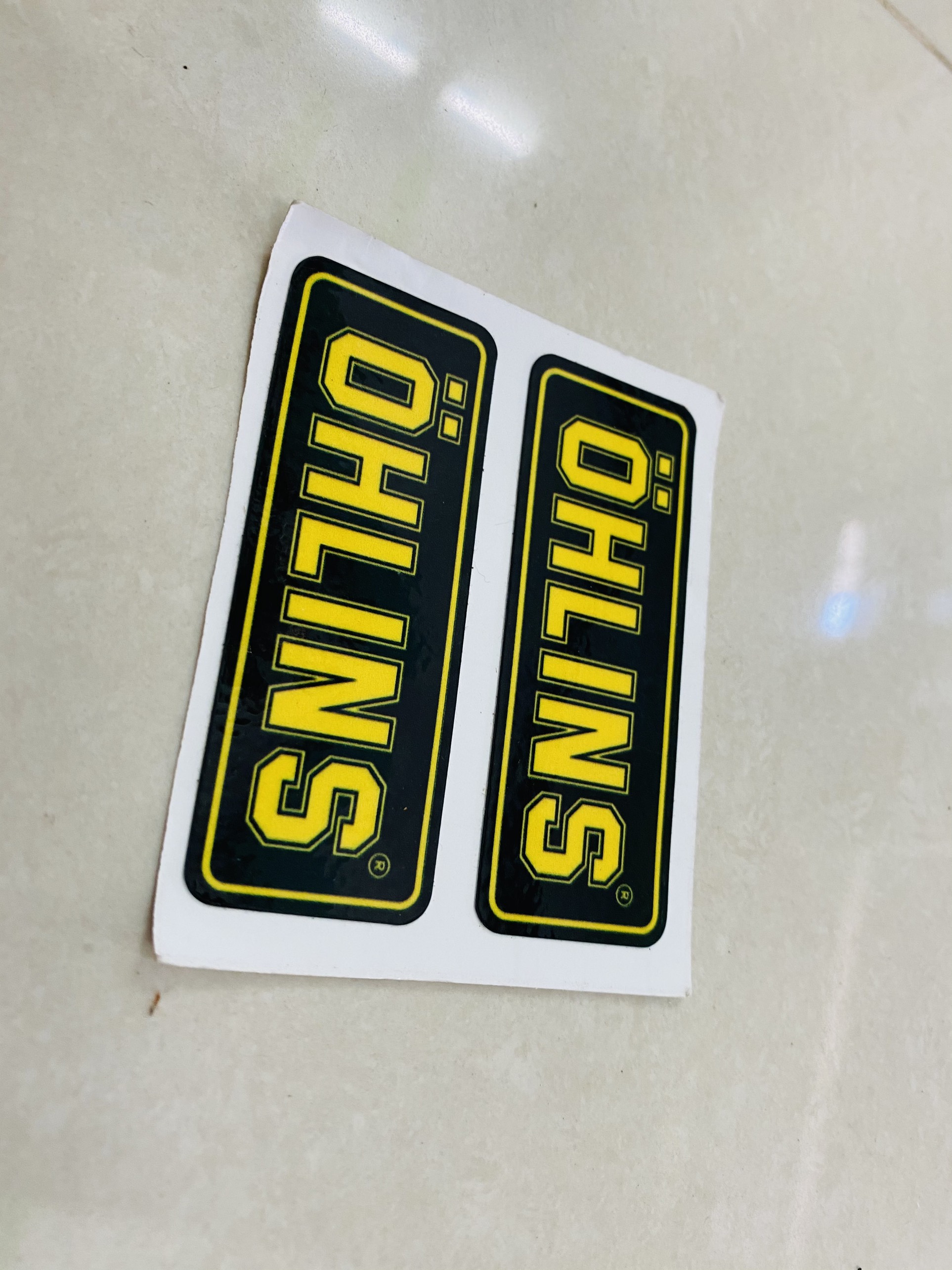 cặp tem ohlins vàng