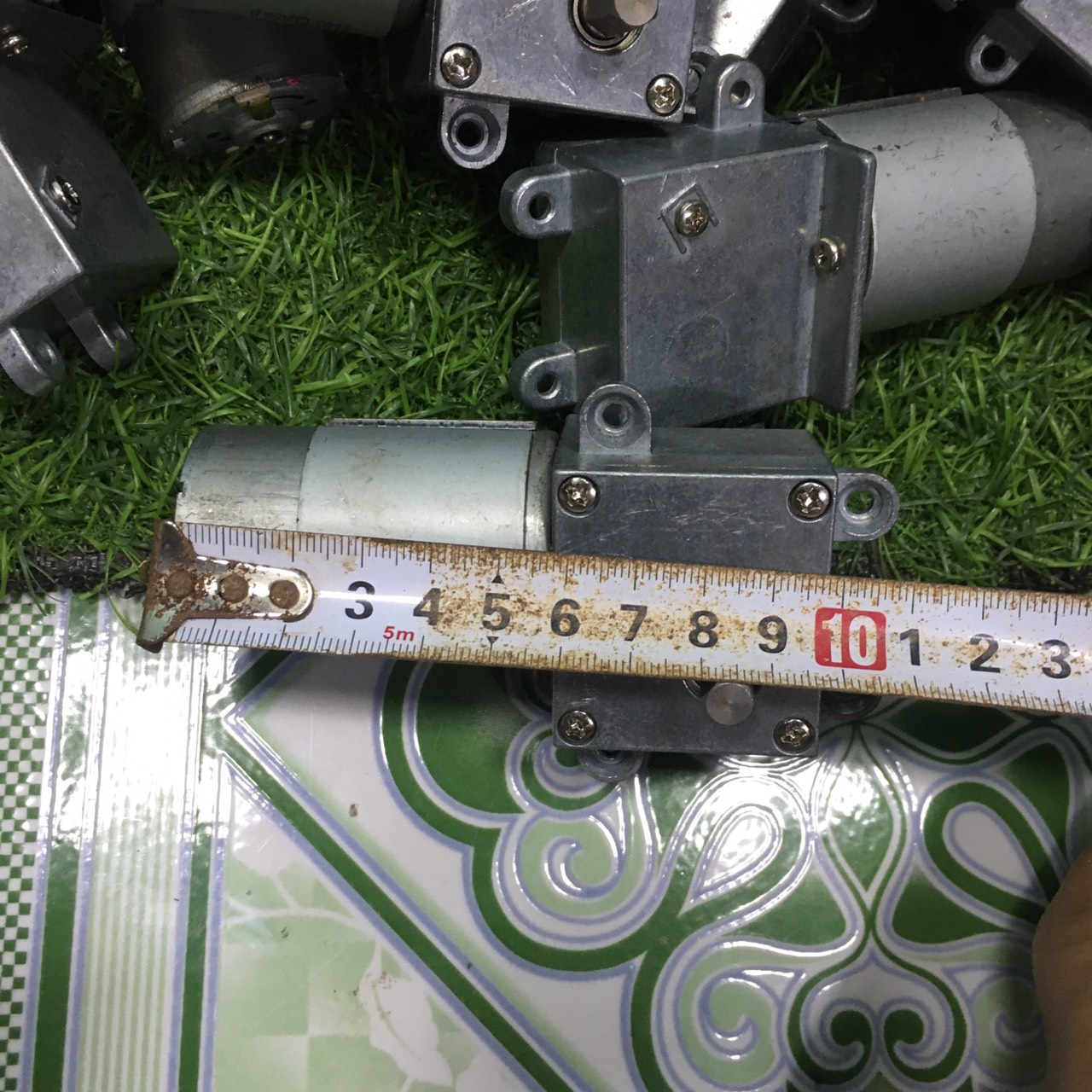 Motor giảm tốc 24V nhật bãi 100% nhông sắt
