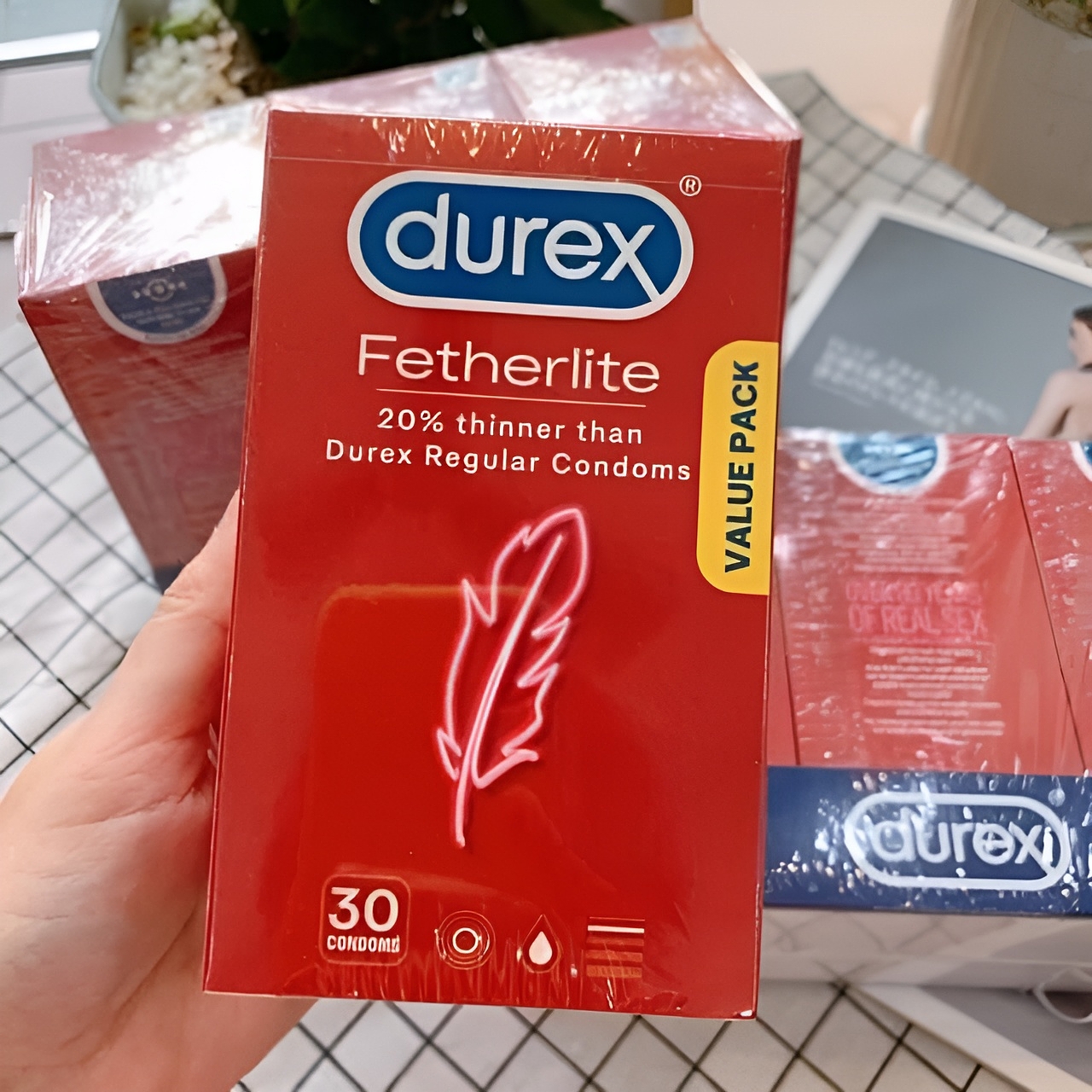 Hộp 30 cái bao cao su Durex Fetherlite Úc siêu mỏng