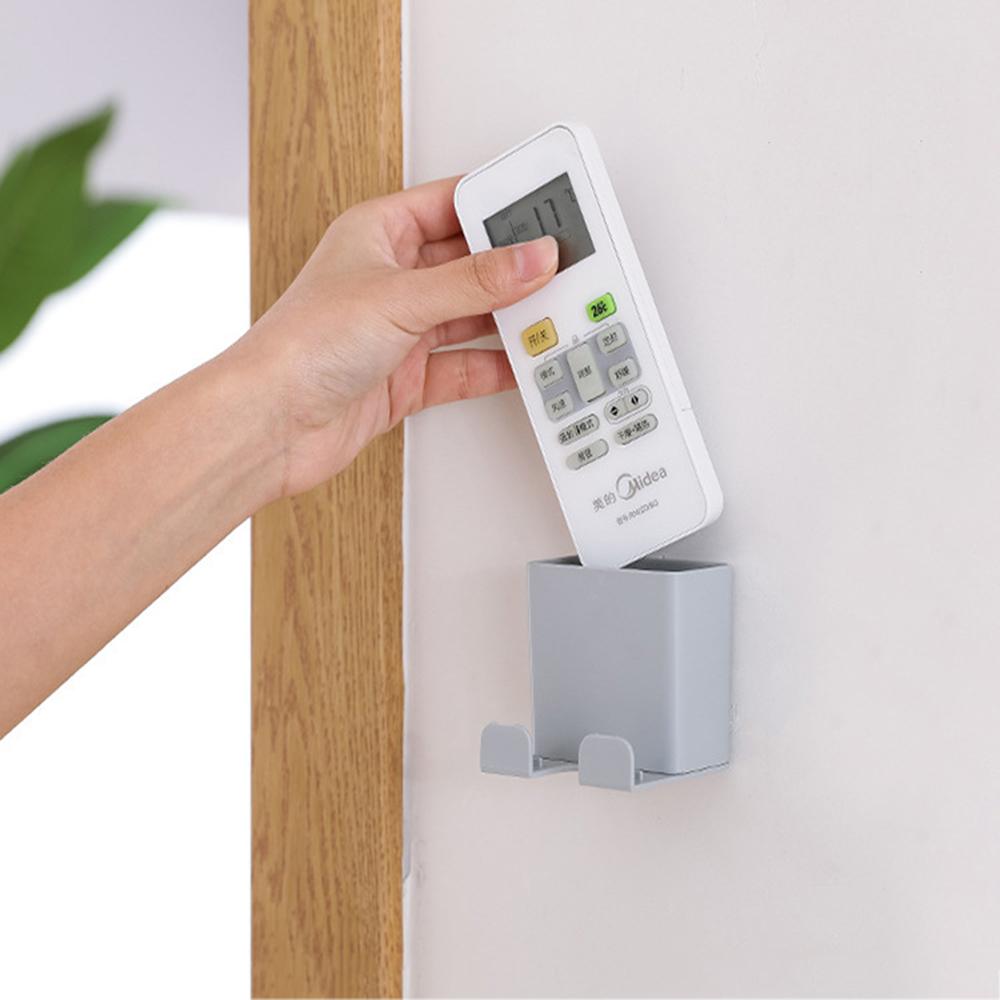Kệ đựng remote máy lạnh - Hộp đựng điều khiển - Gía lưu trử sạc điện thoại dán tường -Có móc máng chui điện