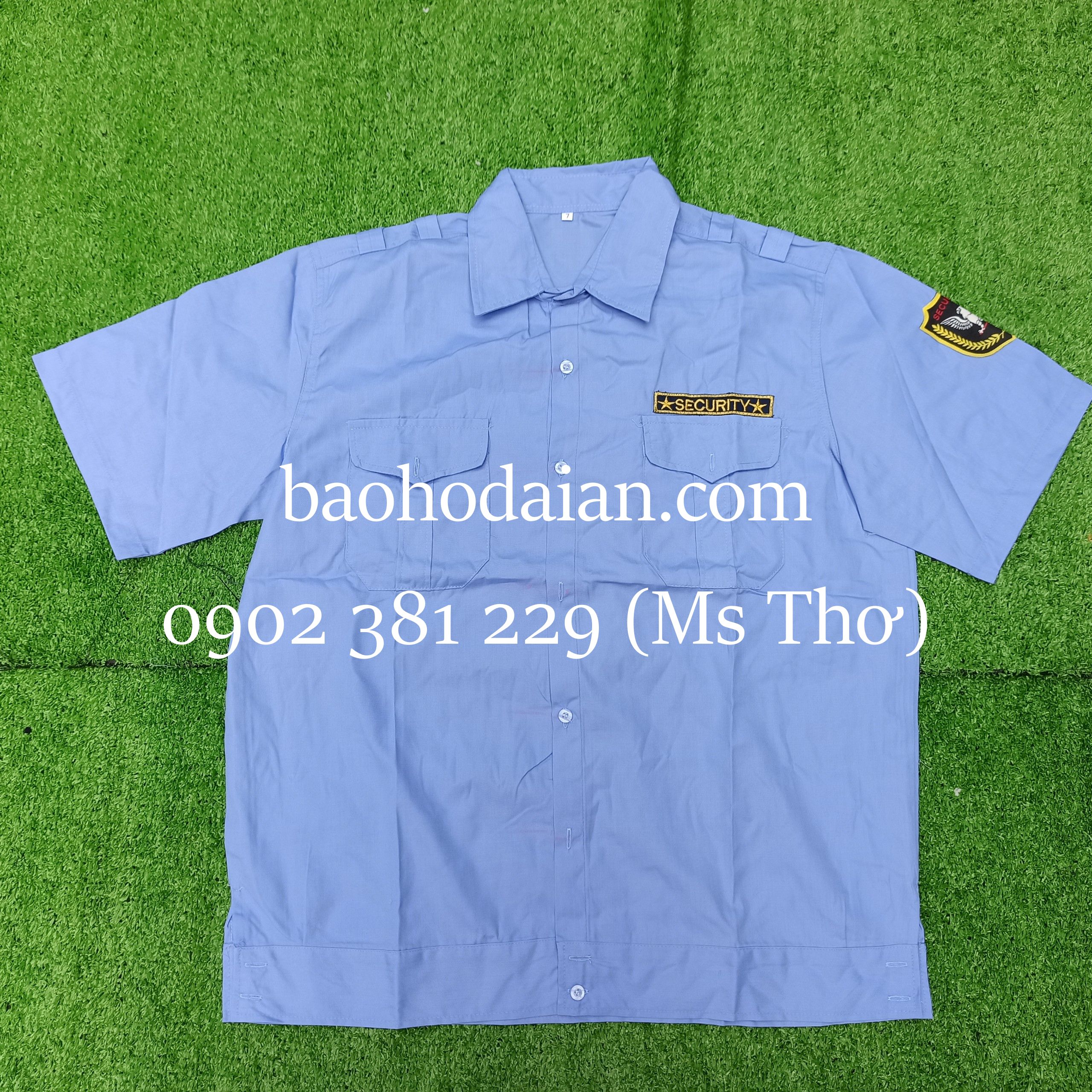 Áo bảo vệ bo dưới kiểu budong màu xanh dương cộc tay kèm 2 logo - hình thật