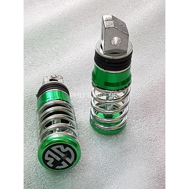 Gác chân sau lò xo xe máy ( SL: 1 cặp, tặng kèm 2 con ốc kiểu để bắt)