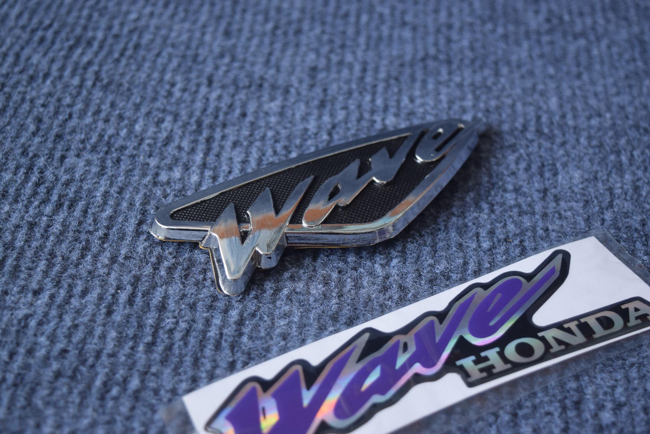 Tem logo nổi Wave dán trang trí.