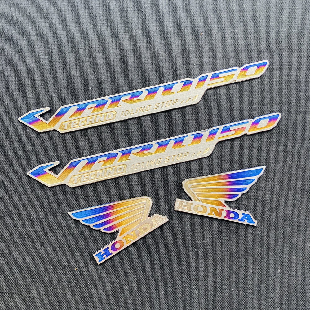[HCM][CHUYÊN TITAN GIÁ 2 CẶP] TEM TITAN CHỮ VARIO TECHNO IDLING STOPTEM TITAN HONDA CÁNH CHIM TRANG TRÍ  KEO 3M CAO CẤP (CHẤT LIỆU 100% TITAN)
