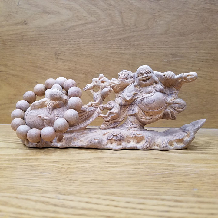 Tượng phật di lặc để ô tô gỗ xá xị thơm