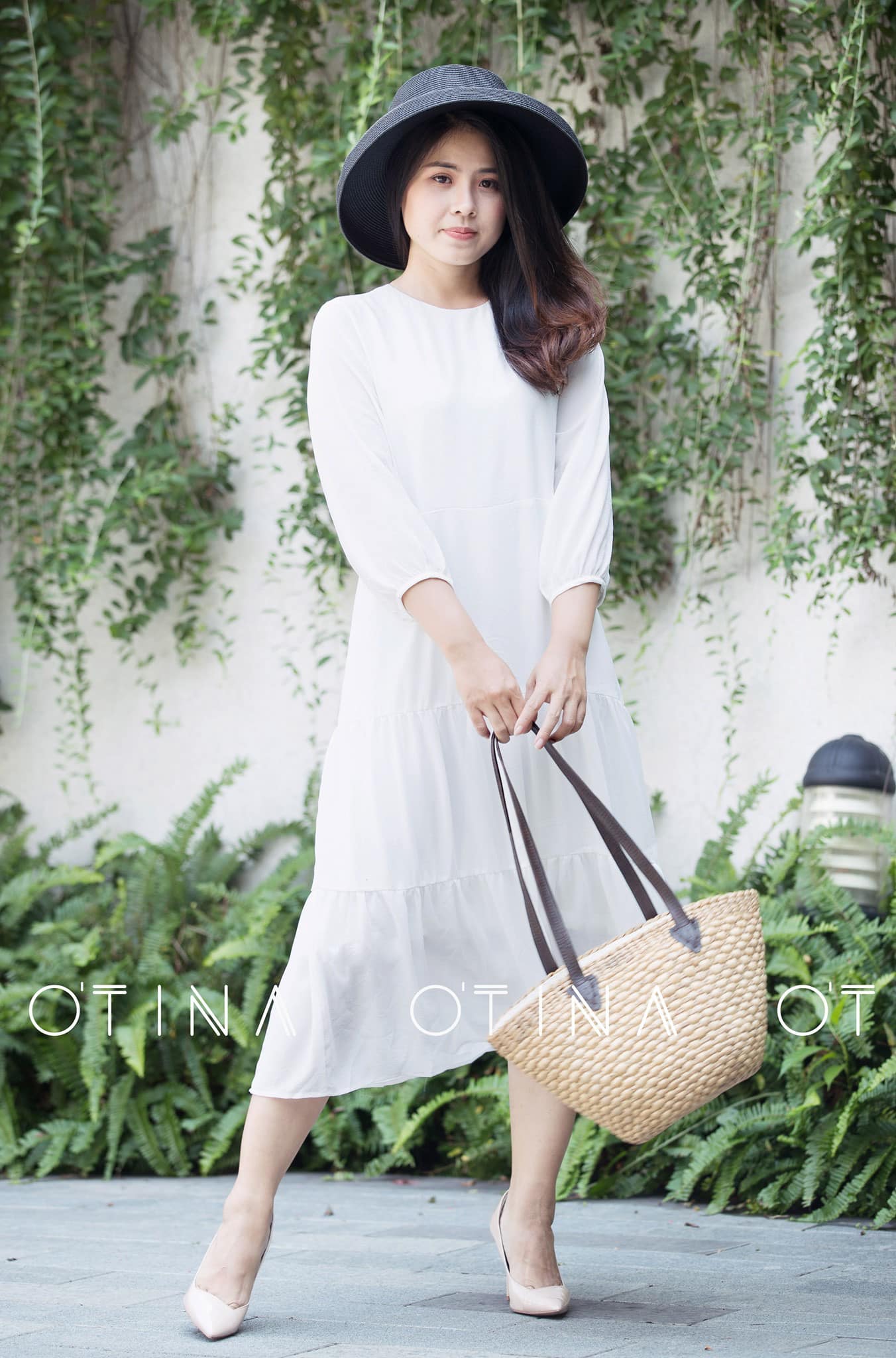 Đầm trắng tay dài babydoll