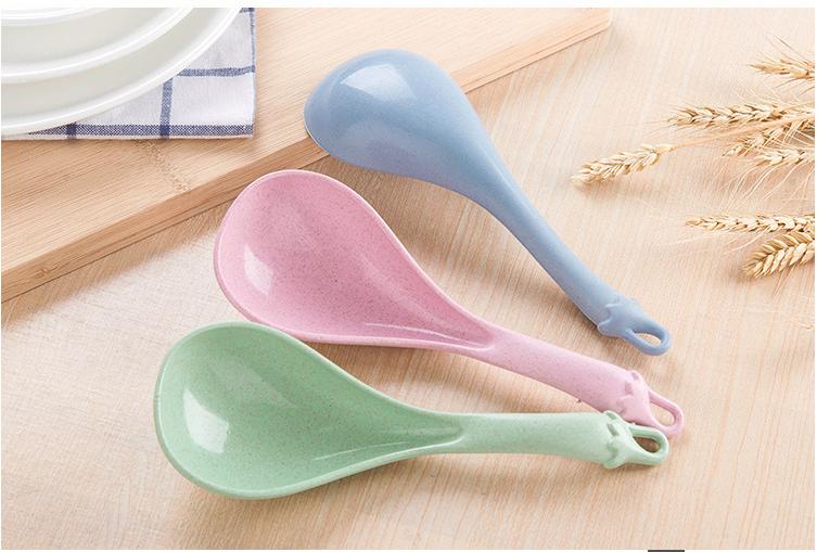 Lược tròn chải tóc uốn cán đen