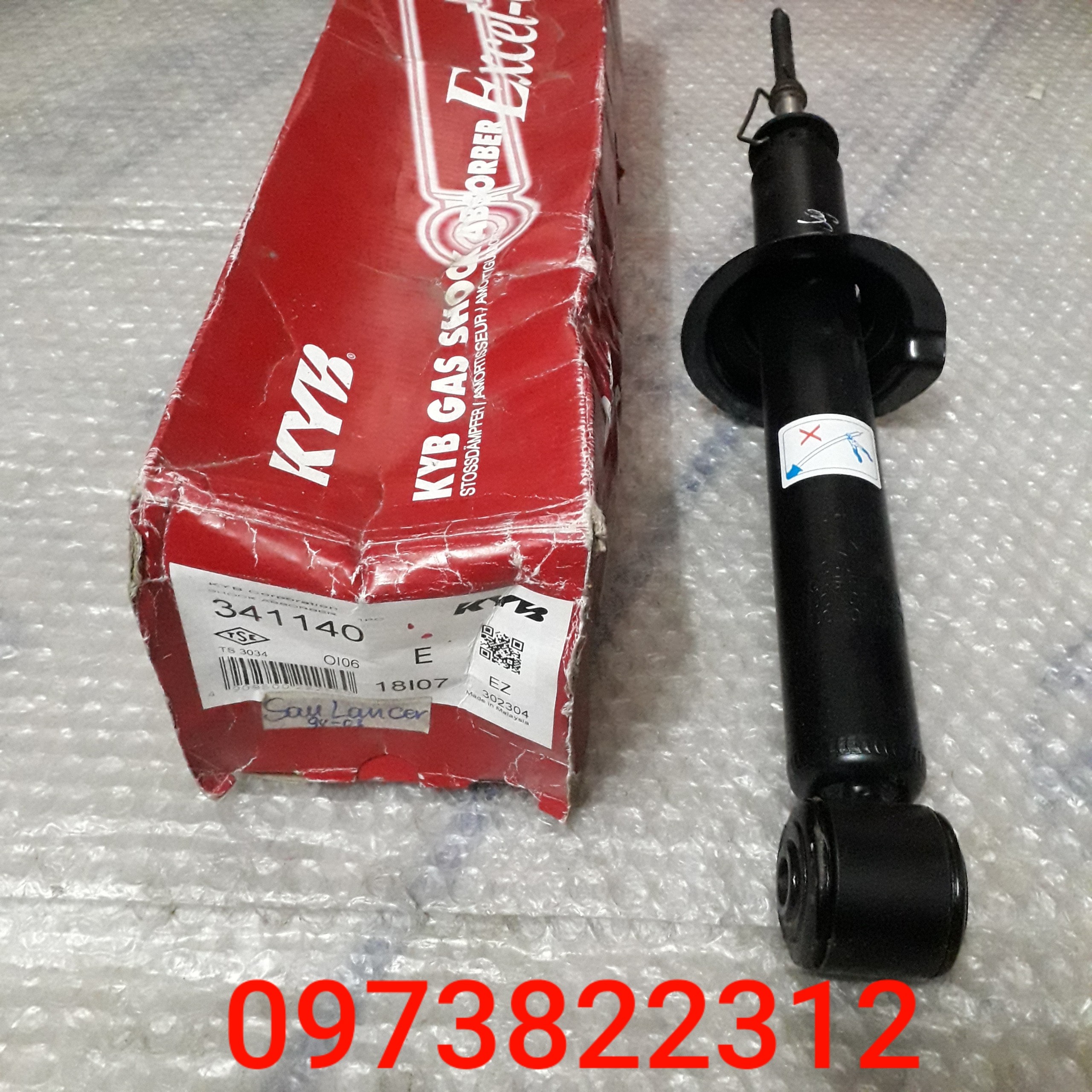 Giảm xóc sau lancer 98-03