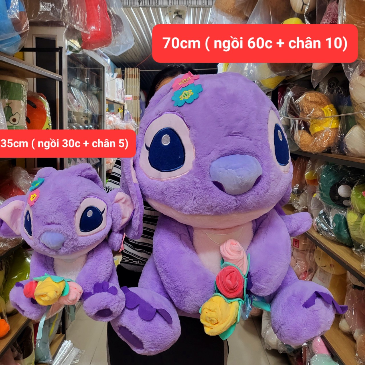 THÚ BÔNG,GẤU BÔNG STITCH TÍM CẦM HOA