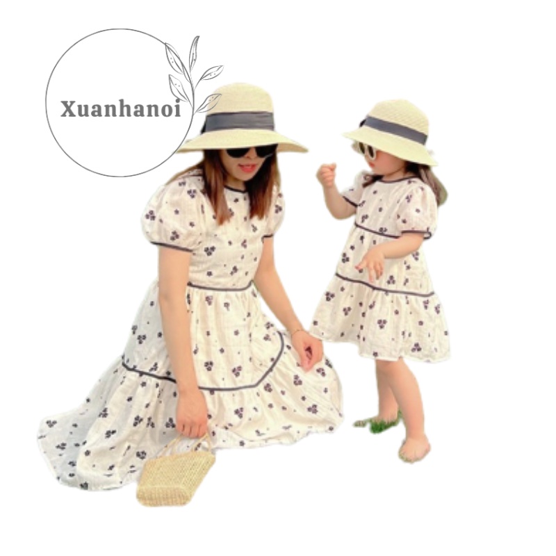 Váy bé gái babydoll hoa cúc đen viền đen tay bồng XHN1012