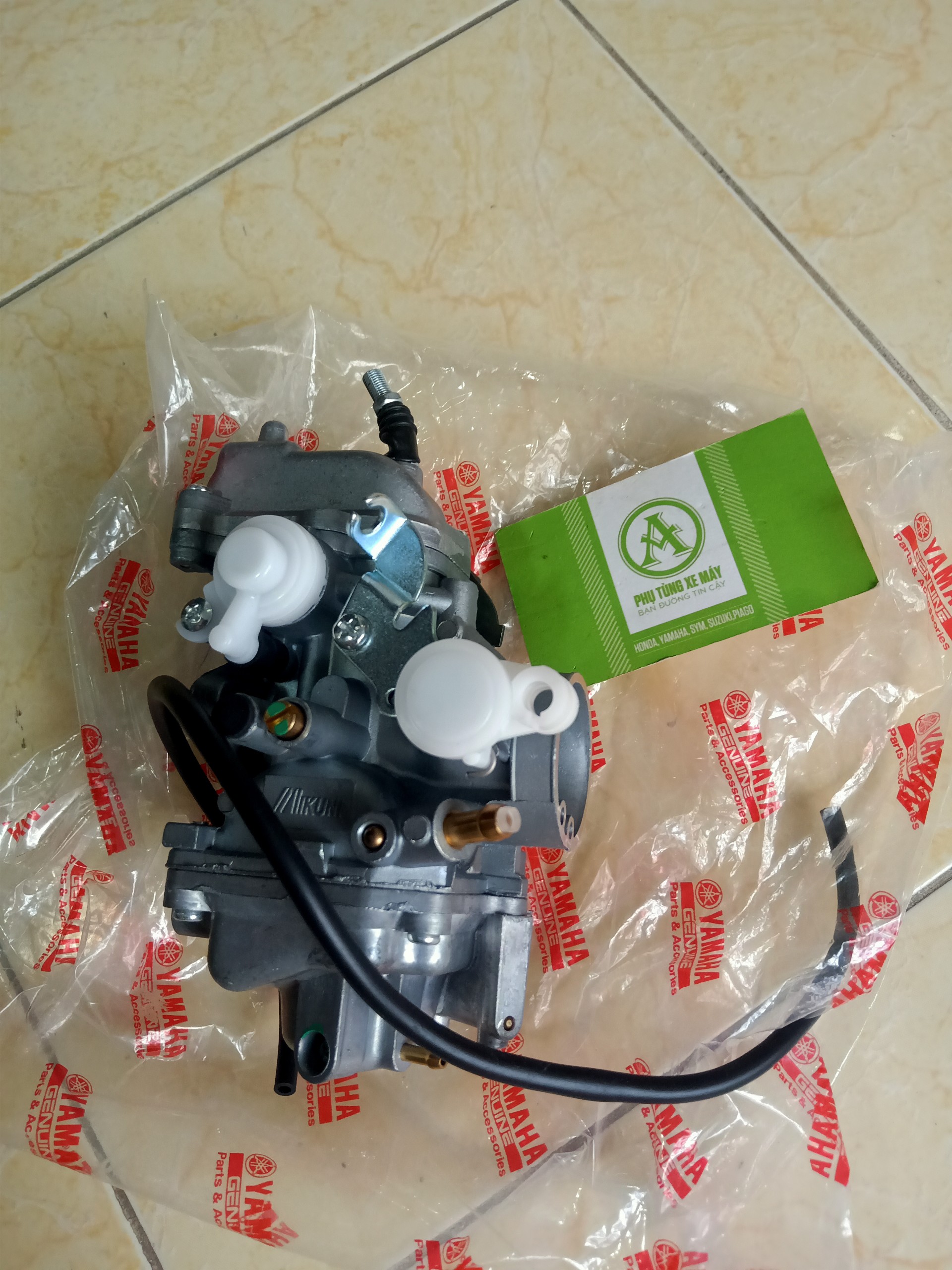 Bình xăng con Exciter 135 đời 4số ( đời đầu )